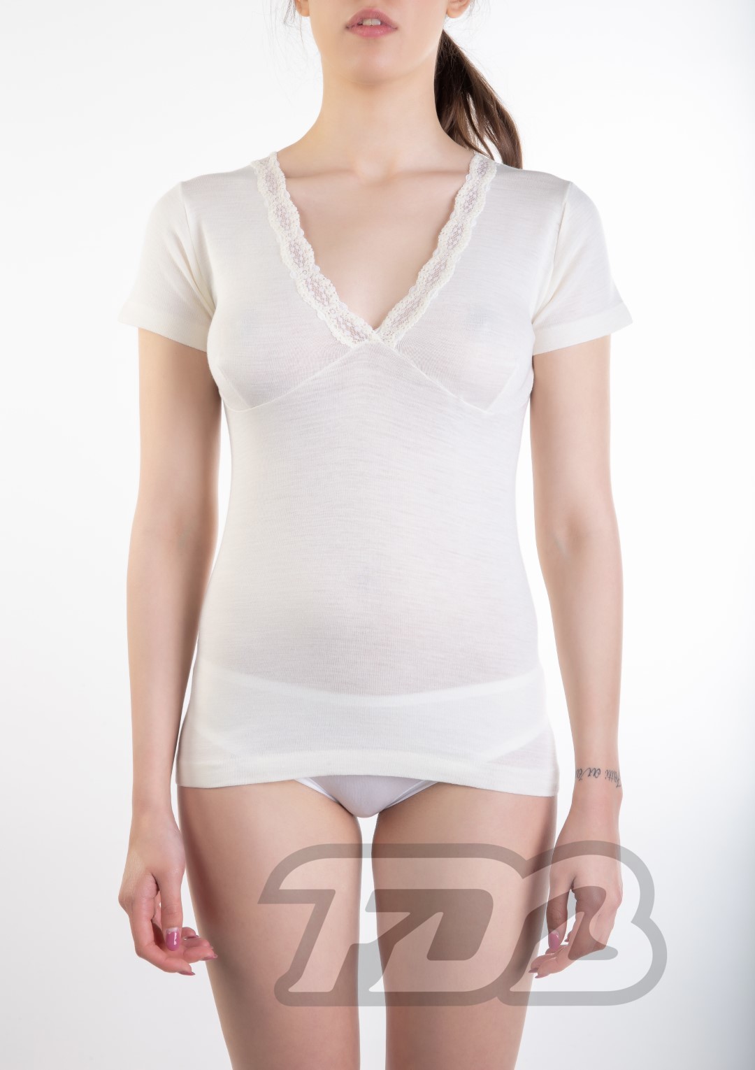 Mezza manica forma del seno con pizzo